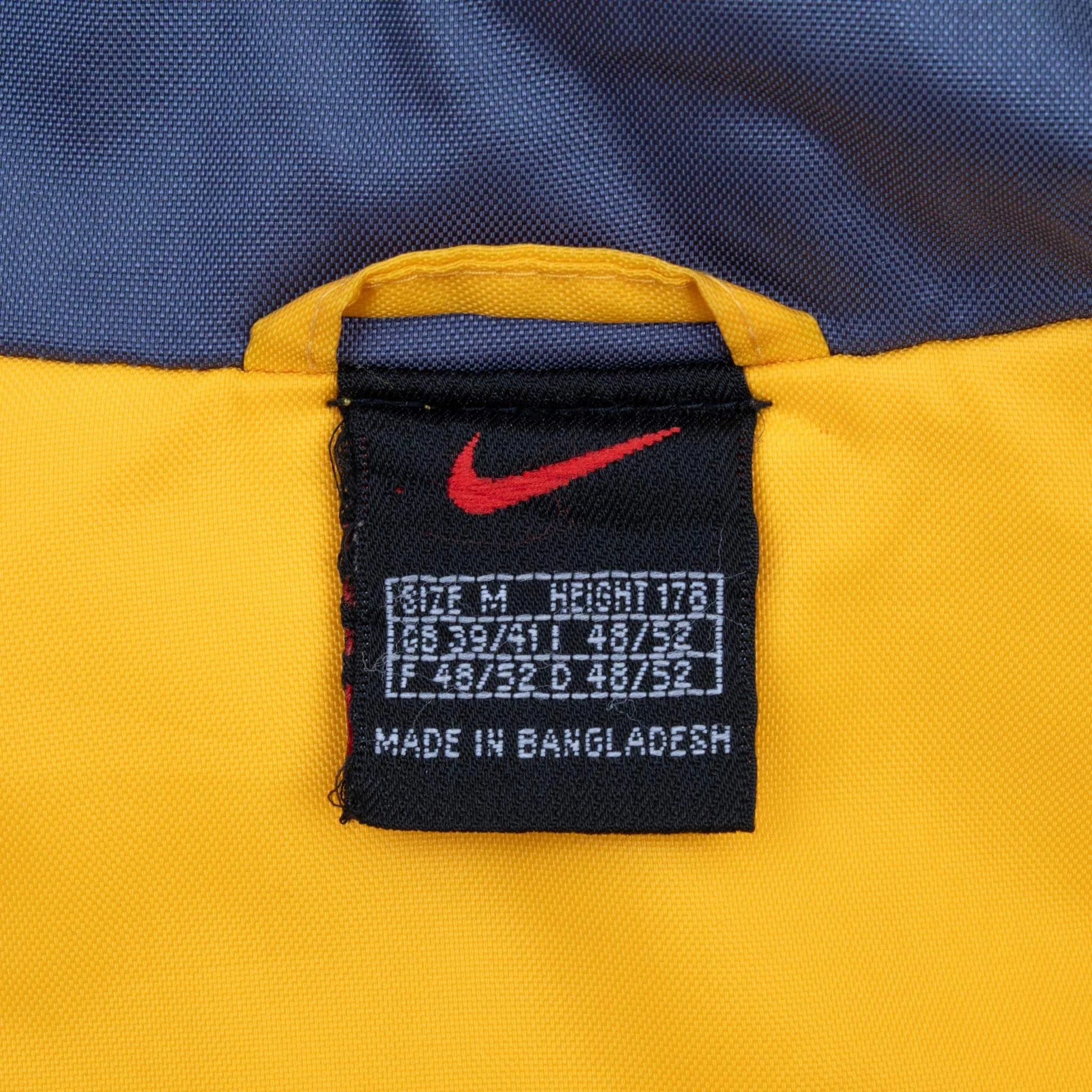 VINTAGE NIKE SPELLOUT YELLOW WINDBREAKER RAIN JACKET 1990S SIZE MEDIUM